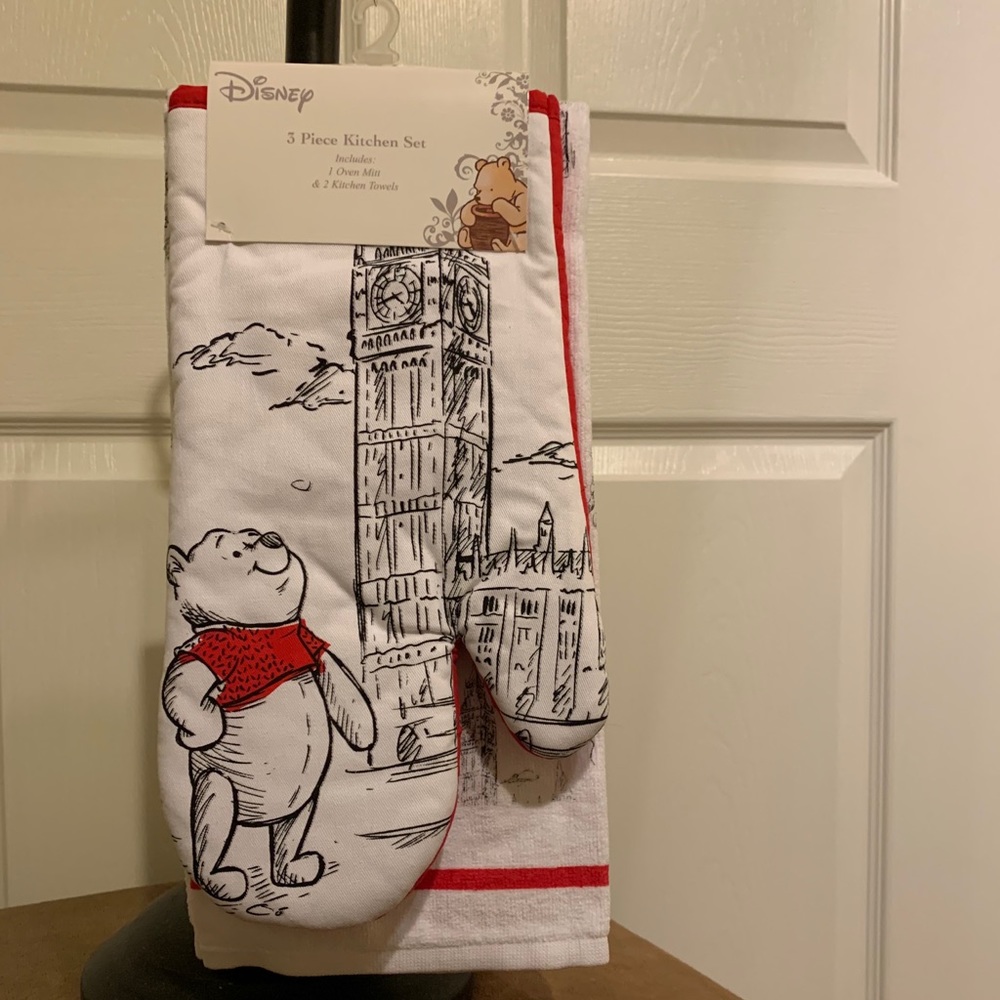 Winnie the Pooh oven mitt and 2 kitchen towels